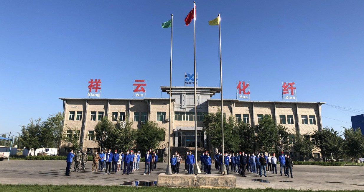 Production workshop at the Manas Xiangyun factory — the line visitors see on a factory audit